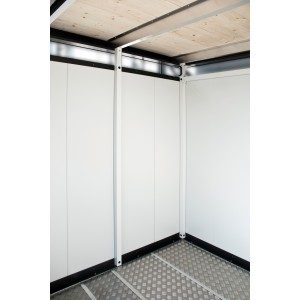 A light interior coating inside the Biohort CasaNova. White wall and a grey floor.
